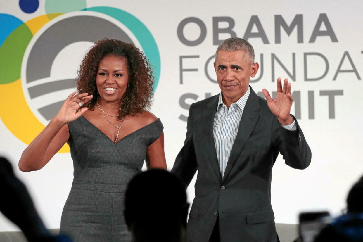 L'ex-président américain Barack Obama et son épouse Michelle au sommet de la Fondation Obama sur le campus de l'Illinois Institute of Technology, le 29 octobre 2019 à Chicago.  - Credit:Scott Olson/Getty Images via AFP