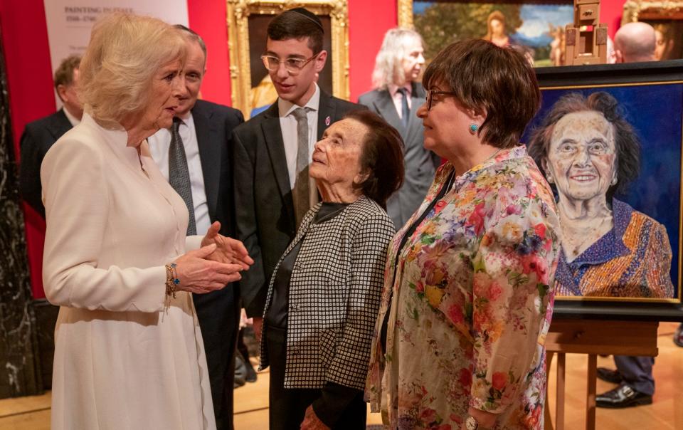 The Duchess of Cornwall talks with survivor Lily Ebert and family - News Group Newspapers Ltd/Arthur Edwards