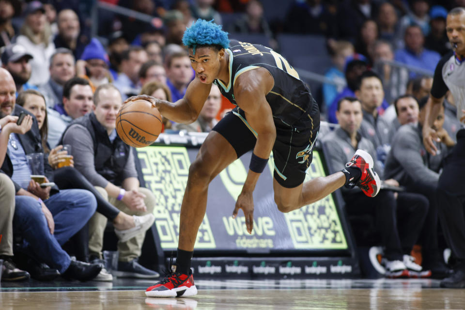 Charlotte Hornets forward Kai Jones runs for a fast break after stealing the ball during the first half of an NBA basketball game against the New York Knicks in Charlotte, N.C., Friday, Dec. 9, 2022. (AP Photo/Nell Redmond)