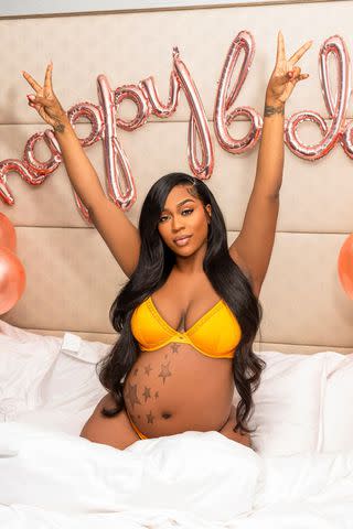 <p>Will Kennedy</p> Kash Doll shows off her bump as she celebrates her birthday