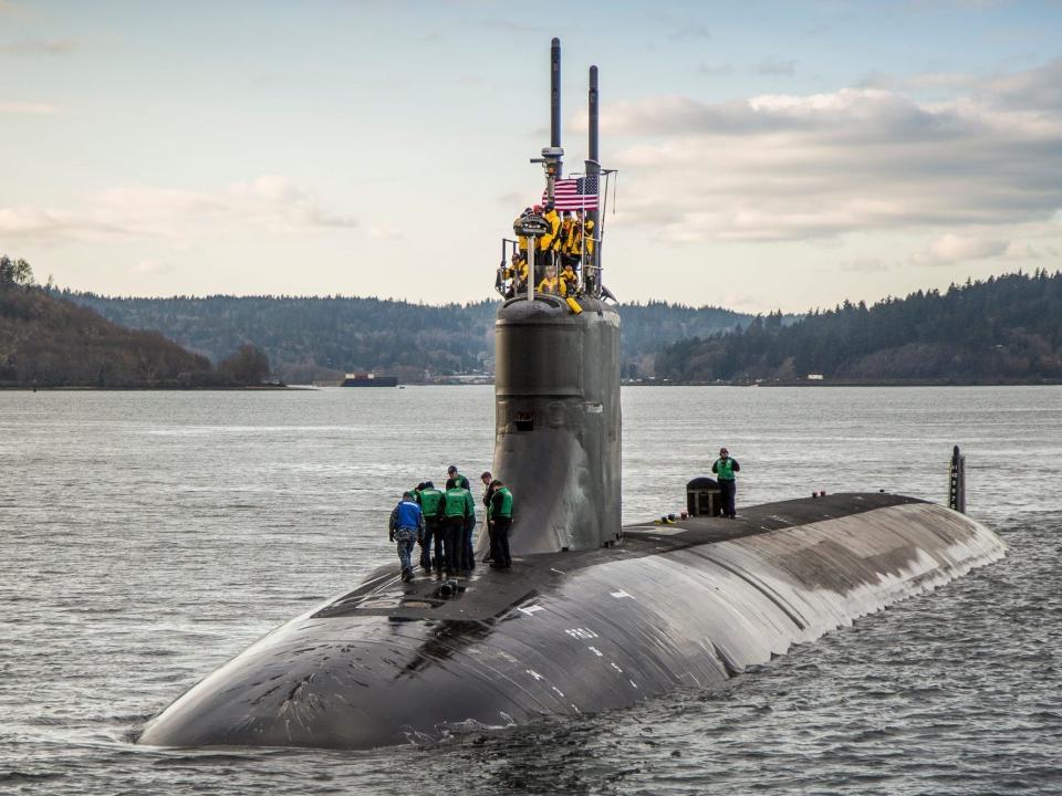 The Seawolf-class fast-attack submarine USS Connecticut (SSN 22) departs Puget Sound Naval Shipyard for sea trials following a maintenance availability.