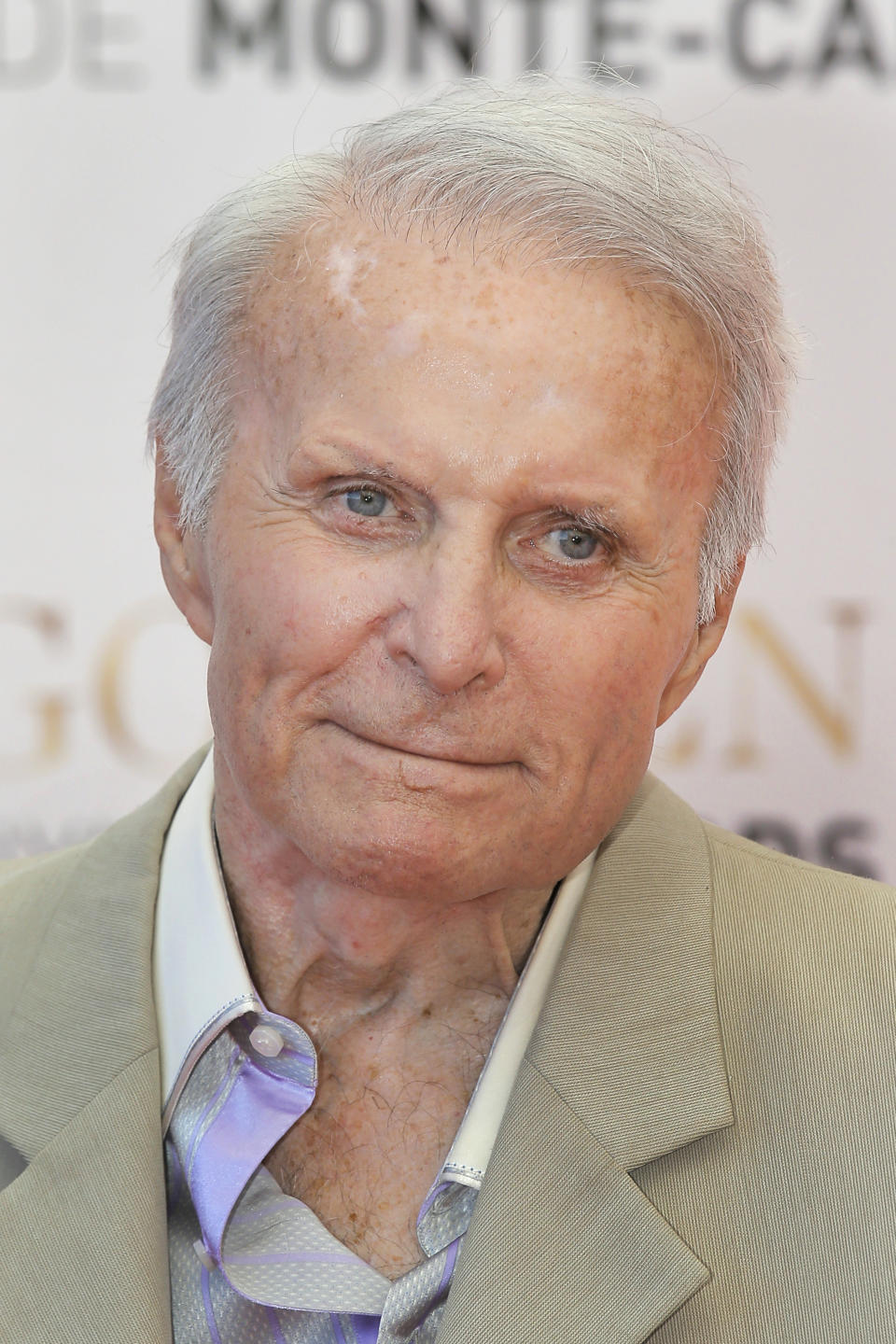 FILE - In this June 13, 2013, file photo, actor Robert Conrad poses for photographers during the closing ceremony of the 2013 Monte Carlo Television Festival, in Monaco. Conrad, the rugged, contentious actor who starred in the hugely popular 1960s television series "Hawaiian Eye" and "The Wild, Wild West," has died at age 84. A family spokesperson says the actor died Saturday morning, Feb. 8, 2020, in Malibu, Calif., from heart failure. (AP Photo/Lionel Cironneau, File)