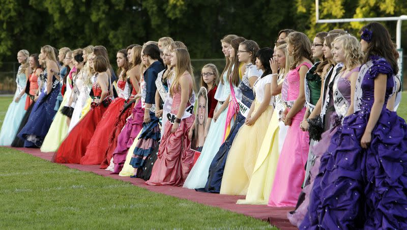 Hillcrest High student homecoming queen candidates stand before the student body during homecoming festivities at the school in Midvale on Sept. 15, 2011.