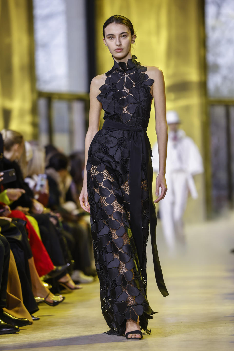 A model wears a creation as part of the Elie Saab Fall/Winter 2023-2024 ready-to-wear collection presented Saturday, March 4, 2023 in Paris. (Vianney Le Caer/Invision/AP)