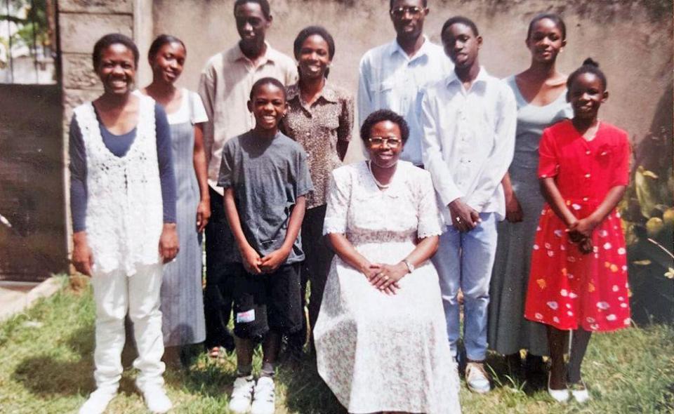 Dorothy Kweyu surrounded by her nine children in xxx