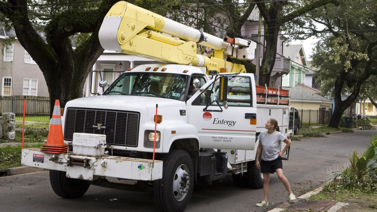 Mandatory Credit: Photo by Str/EPA/Shutterstock (7885162b)Monica Mcklinski a Mid-city Neighborhood Resident Who Chose not to Evacuate Asks Entergy Utility Workers When Electrical Power Will Be Restored to Her Neighborhood After Hurricane Gustav Moved Through New Orleans Louisiana Usa On 03 September 2008 Many Residents Are Now Returning Back to the City After the Mandatory Evacuation However Much of New Orleans is Still Without Electrical PowerUsa Hurricane Gustav - Sep 2008.