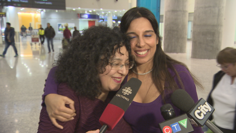 Woman stuck in Russia after Canadian permanent residency snafu is back home in Toronto