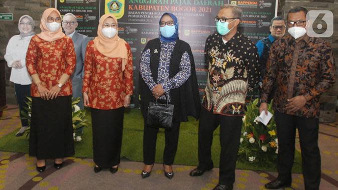 PT Sarana Sentosa Propertindo, anak usaha PT Lippo Karawaci Tbk menerima penghargaan Anugerah Pajak Daerah Kabupaten Bogor, untuk kategori Instansi Terbaik Taat Pajak yang digelar di Megamendung, Bogor. (Liputan6.com/HO/LPKR)