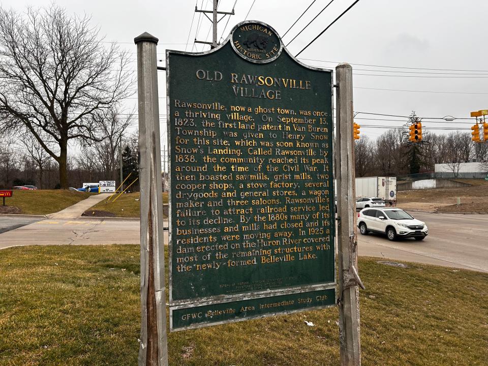 A Michigan Historical Marker in front of a McDonald's along Rawsonville Road in Van Buren Township tells the story of Rawsonville Village. A once-thriving community, it is now buried under the waters of Belleville Lake.