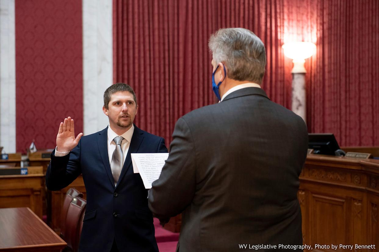 West Virginia House of Delegates member Derrick Evans, left, will face charges for storming the U.S. Capitol.  (Photo: Perry Bennett/West Virginia Legislature/AP)