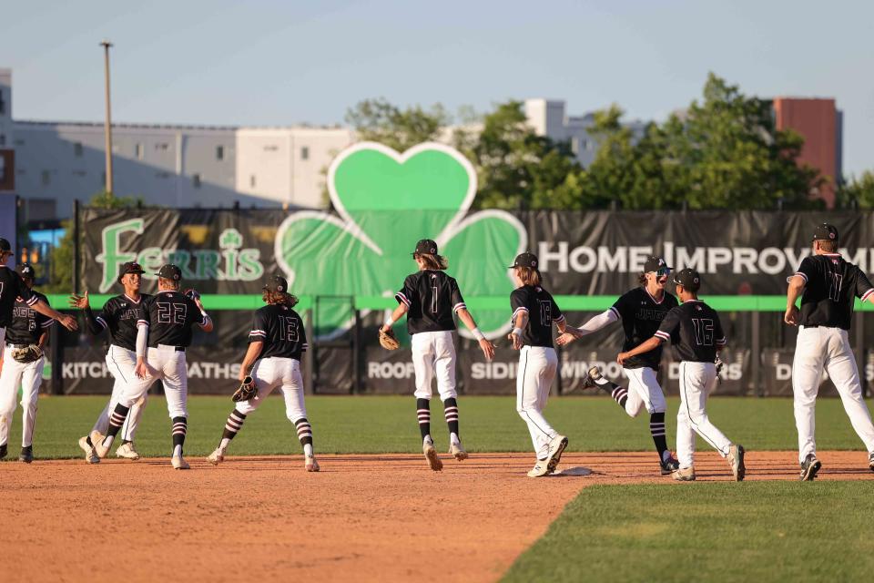 Appoquinimink celebrates after defeating Conrad 7-2 in the DIAA Baseball Tournament semifinal game between Appoquinimink and Conrad Saturday at Frawley Stadium.