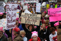 <p>Protesters march in Washington, DC, during the Womens March on January 21, 2017. (JOSHUA LOTT/AFP/Getty Images) </p>