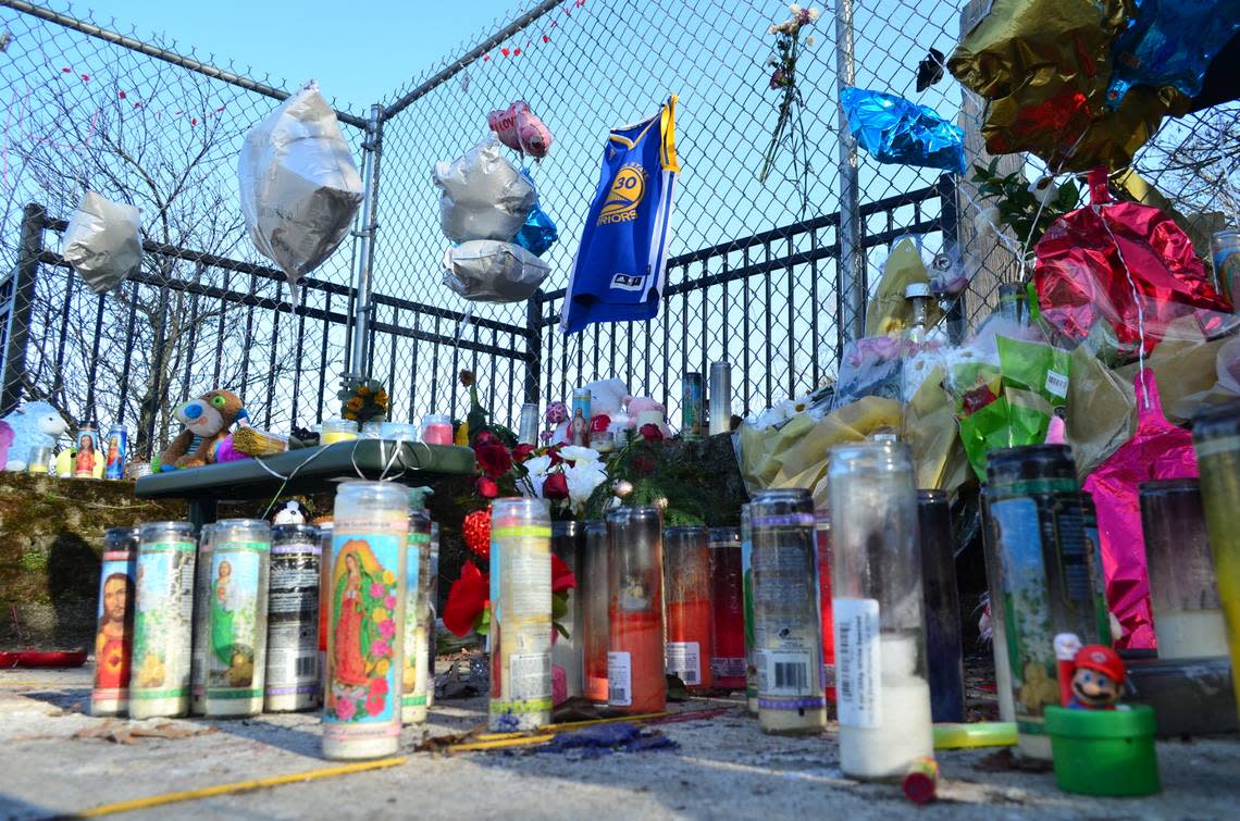 A Stephen Curry Golden State Warriors jersey hangs at a memorial erected for Xaviar Siess, 14, who was killed in a Jan. 12, 2023 shooting. The boy’s stepfather, Kenneth Bradley, said Steph Curry was one of Siess’ favorite basketball players.