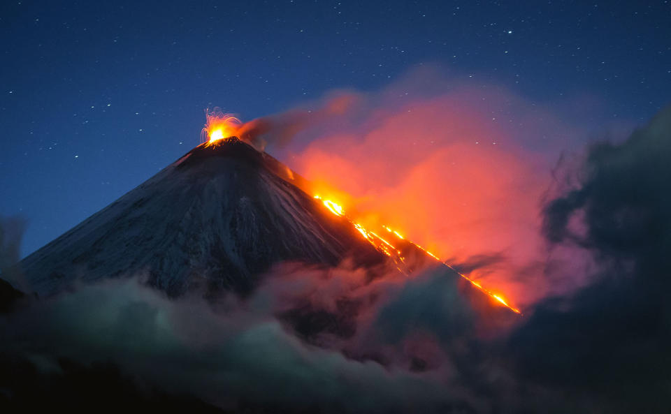 Stunning images capture ‘UFO’ clouds surrounding volcano 