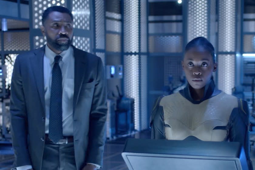 Black Lightnning -- The CW TV Series, Black Lightning -- "The Book of Reconstruction: Chapter One" -- Image Number: BLK401fg_0005r.jpg -- Pictured (L-R): Cress Williams as Jefferson, Nafessa Williams as Anissa -- Photo: The CW -- © 2021 The CW Network, LLC. All rights reserved. Cress Williams and Nafessa Williams in "Black Lightnning" on The CW.