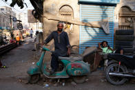 <p>Shahzad stands with his abandoned Vespa scooter in Karachi, Pakistan March 6, 2018. (Photo: Akhtar Soomro/Reuters) </p>