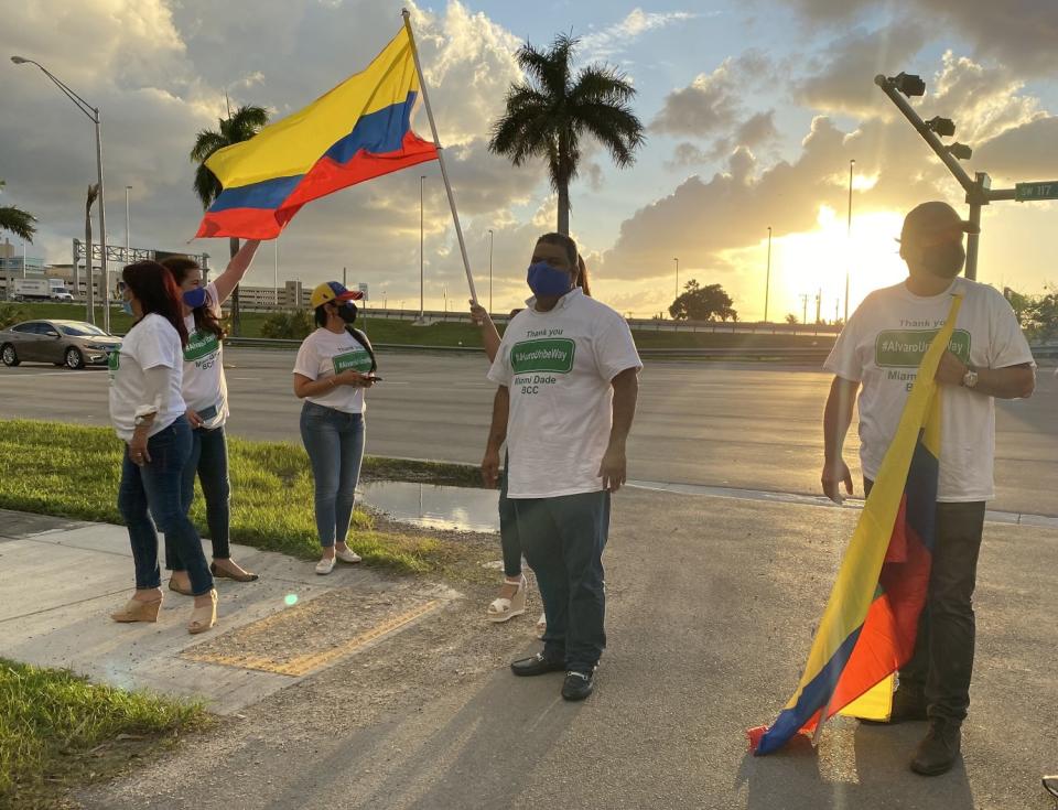 Colombian Americans gather along the soon-to-be-renamed street, Alvaro Uribe Way.