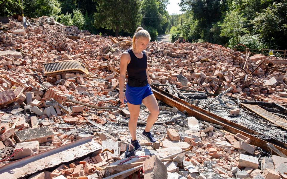 “People will say, ‘Oh, it’s just a pub’, but it was more than that [in terms of] how important this was”:  Customer Lisa Newton in the pub's remains