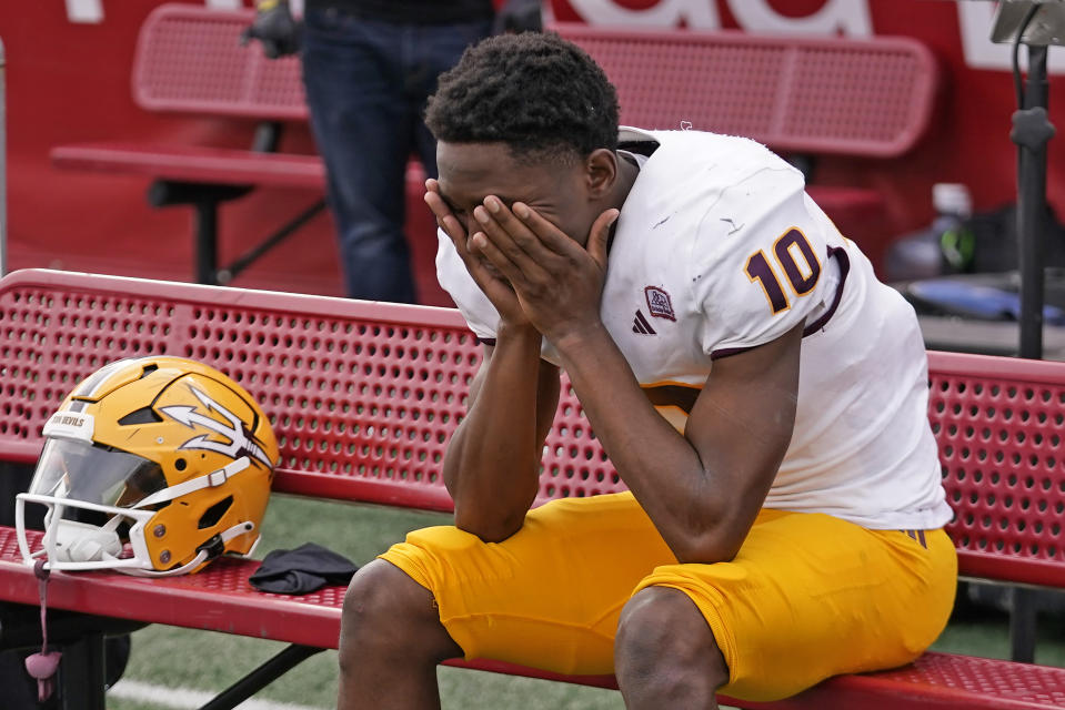 Arizona State defensive back Ed Woods (10) sits on the bench following their NCAA college football game against Utah Saturday, Nov. 4, 2023, in Salt Lake City. (AP Photo/Rick Bowmer)