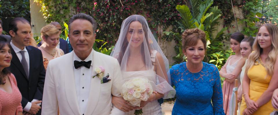 One happy family. Father (Andy Garcia), bride (Adria Arjona) and mother (Gloria Estefan) walk up the aisle in "Father of the Bride."