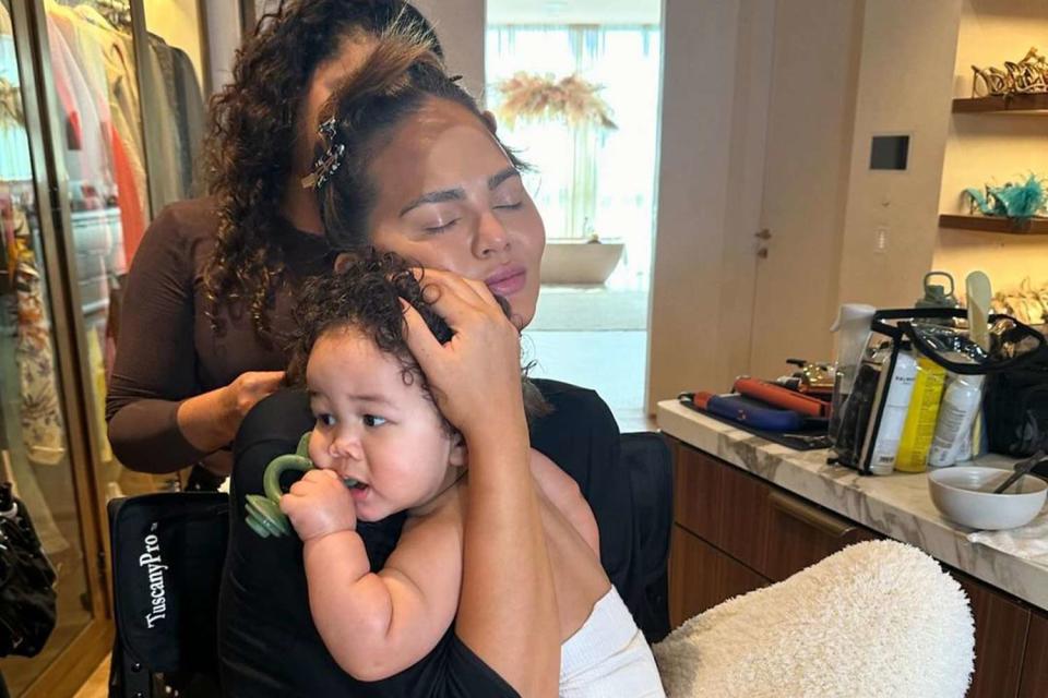 <p>Chrissy Teigen/Instagram</p> Chrissy Teigen cuddles her son Wren