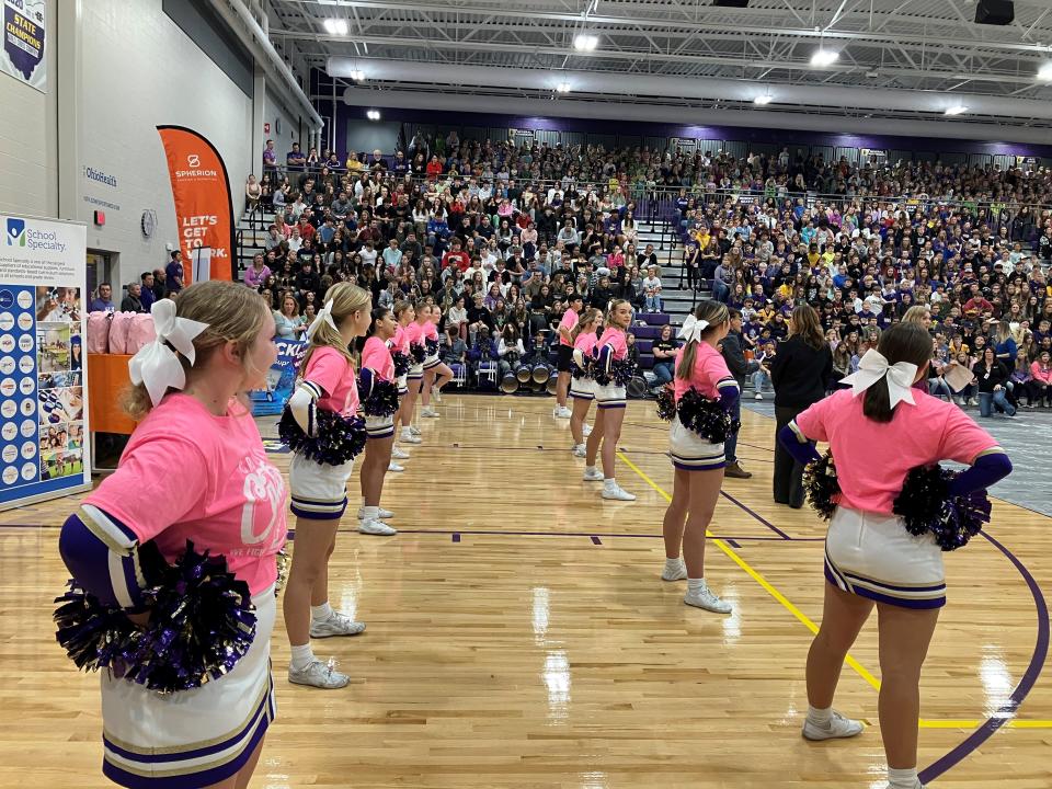 Lexington's cheerleaders were part of a pep rally celebrating a donation of more than $20,000 in school supplies from Spherion Mid Ohio and School Specialty.
