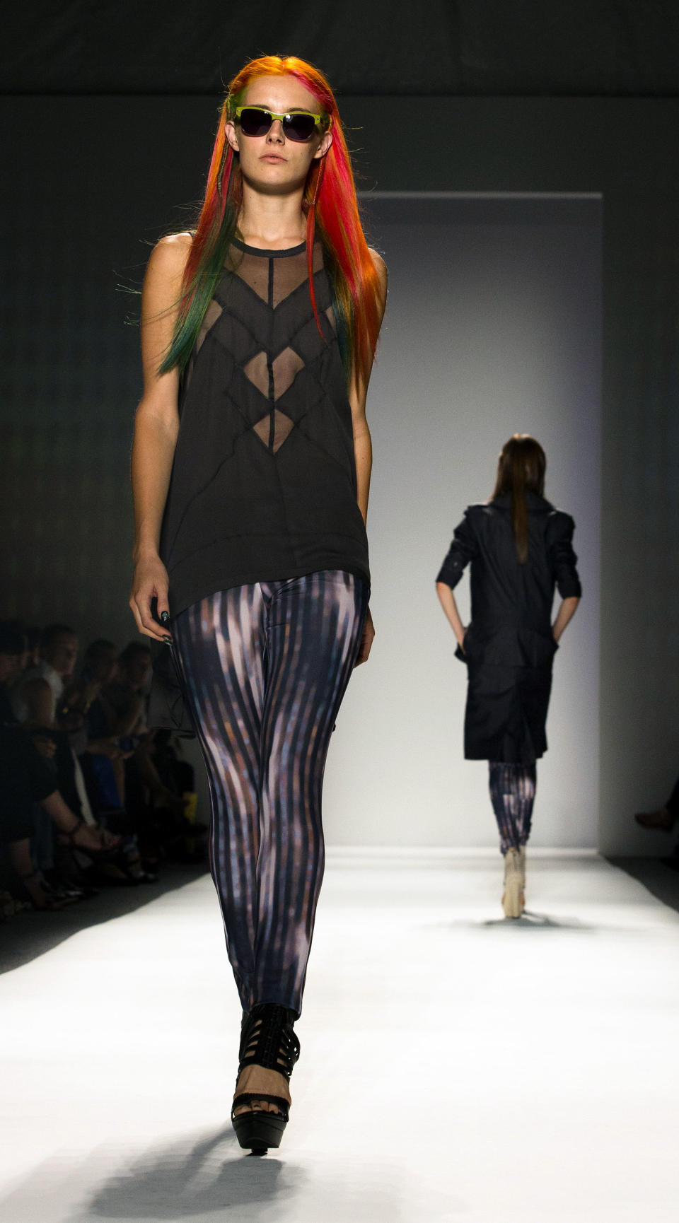 The Nicole Miller Spring 2013 collection is modeled during Fashion Week in New York, Friday, Sept. 7, 2012. (AP Photo/John Minchillo)