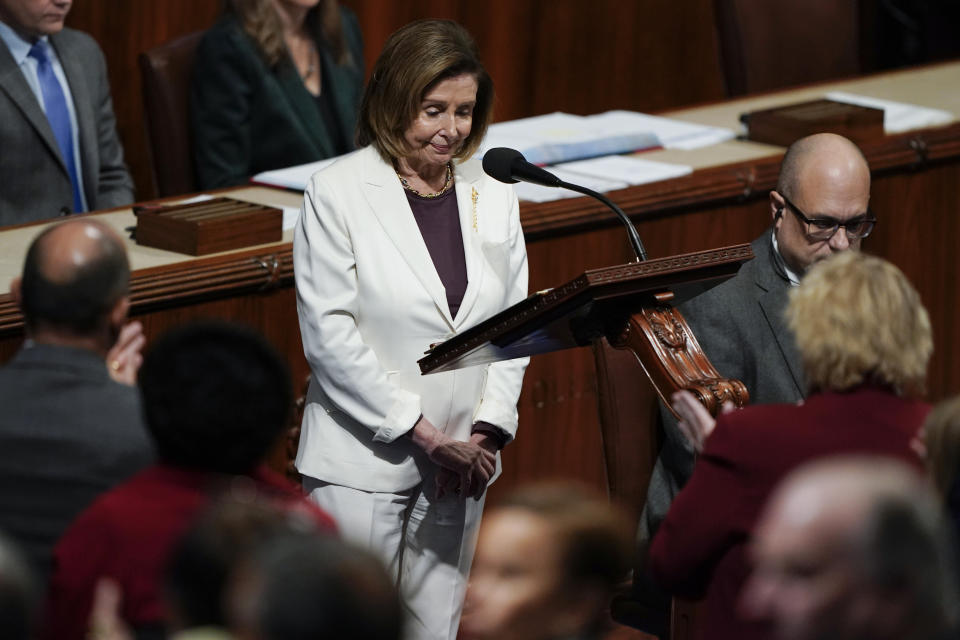 Lawmakers stand and applaud as House Speaker Nancy Pelosi of Calif., pauses as she speaks on the House floor at the Capitol in Washington, Nov. 17, 2022. Pelosi’s decision to step down from Democratic leadership after 20 years has many women admiring the way she wielded power (AP Photo/Carolyn Kaster, File)