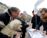 Activists of the opposition Momentum Movement collect signatures to force a referendum on the country's Olympic plans as Budapest bids for the 2024 Olympic Games, in central Budapest, Hungary, February 15, 2017.Picture taken February 15, 2017. REUTERS/Laszlo Balogh