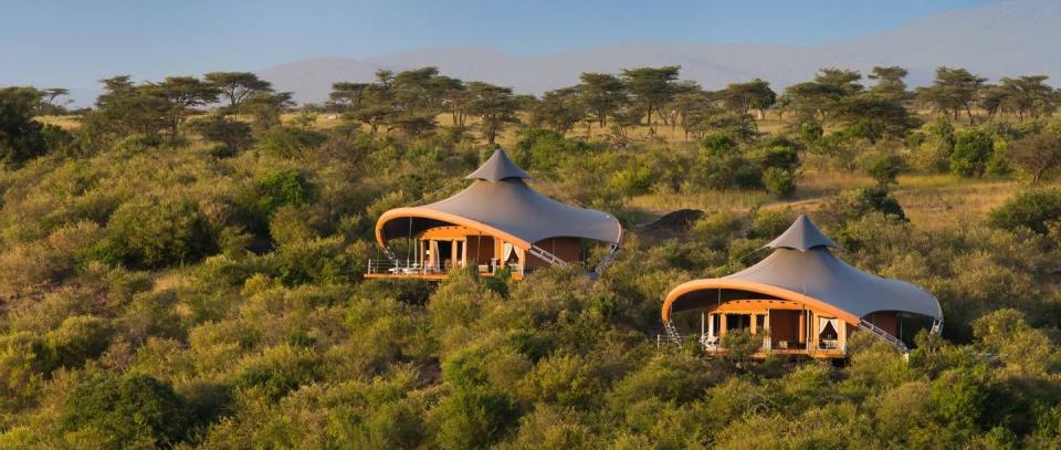 <p>There's luxury camping—or glamping—and then there's this. With 12 luxury tents overlooking acres of Kenya’s Maasai Mara reserve, Mahali Mzuri is truly incredible. Book your trip to sync up with the annual Great Wildebeest Migration if you can.</p><p><a class="link " href="https://go.redirectingat.com/?id=74968X1525080&xs=1&url=https%3A%2F%2Fwww.tripadvisor.com%2FHotel_Review-g294209-d4293067-Reviews-Mahali_Mzuri_Sir_Richard_Branson_s_Kenyan_Safari_Camp-Maasai_Mara_National_Reserve_Rif.html&sref=https%3A%2F%2Fwww.housebeautiful.com%2Flifestyle%2Fg25781535%2Fnature-travel-hotels%2F" rel="nofollow noopener" target="_blank" data-ylk="slk:BOOK NOW;elm:context_link;itc:0;sec:content-canvas">BOOK NOW</a> <strong><em>Mahali Mzuri</em></strong></p>