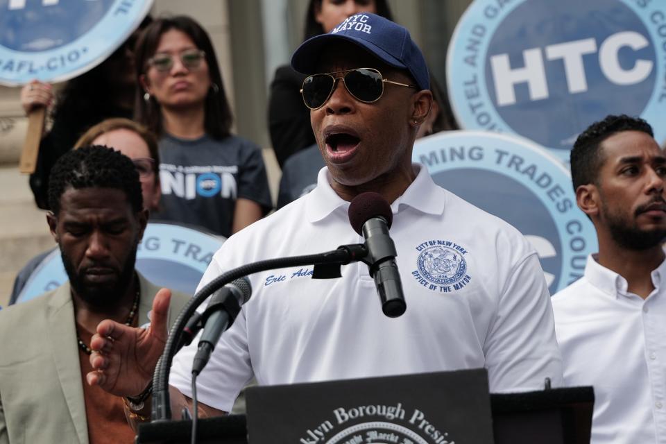 New York Mayor Eric Adams addresses a rally in support of asylum-seekers on Aug. 15, 2023.