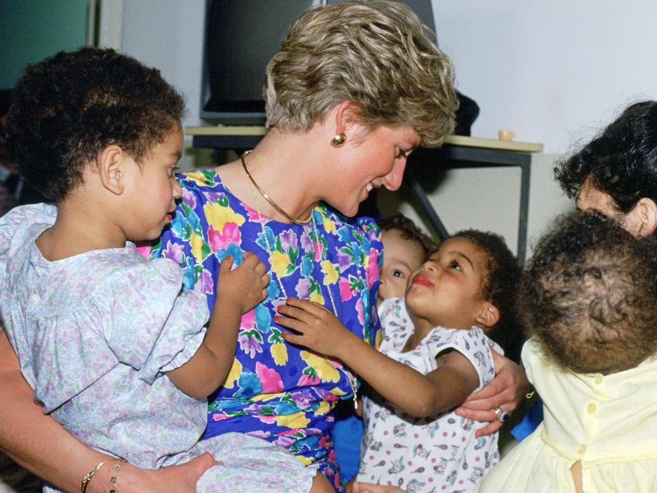 Princess Diana visits an HIV/AIDS hostel in Brazil, 1991.