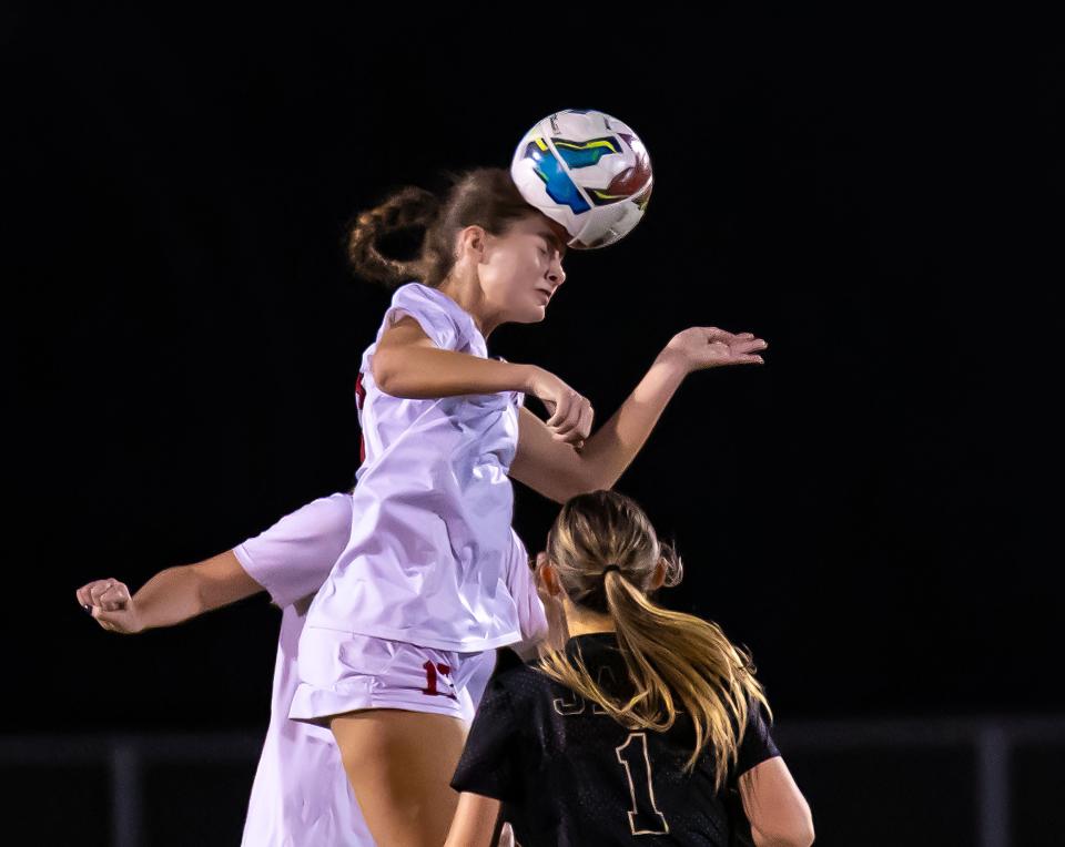 Lake Travis' Avery Lang goes up for a header during the first half of the Cavaliers' District 26-6A match against Johnson in February. The high school soccer season comes to a close this weekend at the UIL state tournament in Georgetown.