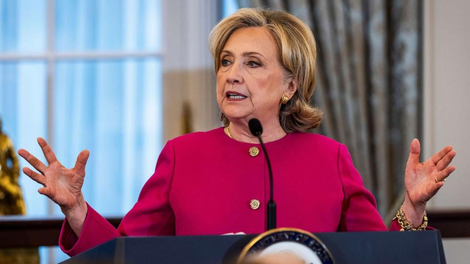 PHOTO: Former Secretary of State Hillary Clinton speaks ahead of the unveiling of her official portrait at the State Department in Washington, D.C., Sept. 26, 2023. (Jim Lo Scalzo/EPA via Shutterstock)