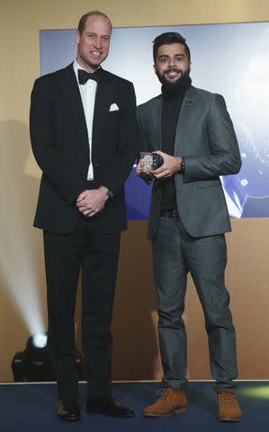 <p>Arthur Edwards - WPA Pool/Getty</p> Sonny Khan after receiving his Legacy Award from Prince William on Mar. 14