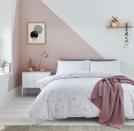 <p>A lovely girls' bedroom idea is this pink and white colour scheme. The soft pink works in harmony with the crisp white, while the diagonal paint effect creates a feature wall. White furniture and oak shelving completes the look.</p><p>Pictured: Scattered Stars Pink and White Bed Linen in Organic Cotton Percale, <a href="https://www.thefinecottoncompany.com/scattered-stars-white-pink-bed-linen-scattered-stars-white-and-pink-organic-cotton-bedding-p1394" rel="nofollow noopener" target="_blank" data-ylk="slk:The Fine Cotton Company;elm:context_link;itc:0;sec:content-canvas" class="link ">The Fine Cotton Company</a></p>