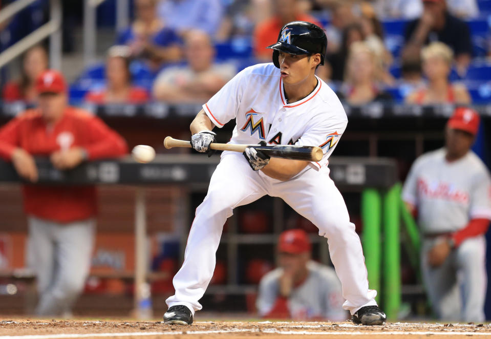 MIAMI, FL - MAY 06: Wei-Yin Chen #54 of the Miami Marlins bunts during the second inning of the game against the Philadelphia Phillies at Marlins Park on May 6, 2016 in Miami, Florida. (Photo by Rob Foldy/Getty Images)