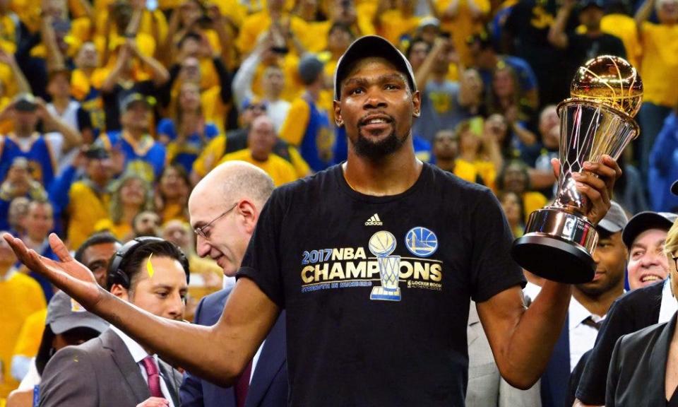 Golden State Warriors forward Kevin Durant (35) celebrates after winning the NBA Finals MVP in game five of the 2017 NBA Finals at Oracle Arena in Oakland on June 12, 2017.
