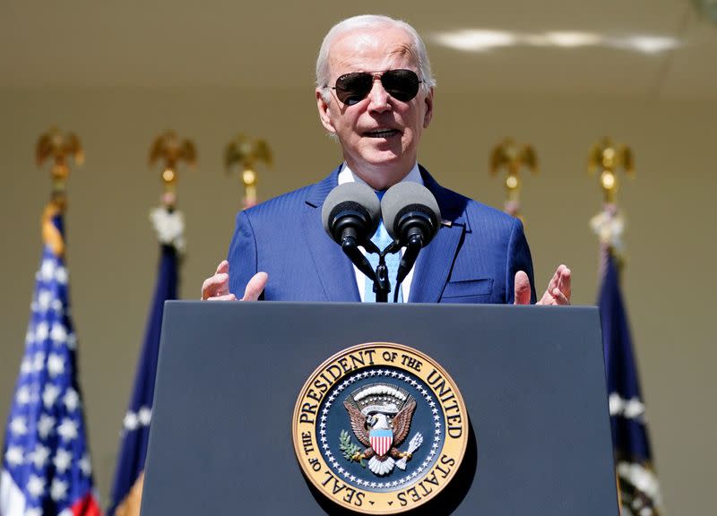 U.S. President Joe Biden signs executive order on child care and eldercare during Rose Garden event at the White House in Washington