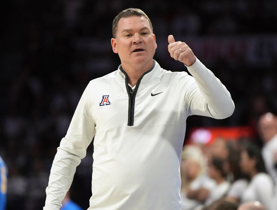 FILE - Arizona head coach Tommy Lloyd gestures during the first half of an NCAA college basketball game against UCLA, Jan. 21, 2023, in Tucson, Ariz. Arizona had a strong second season under coach Tommy Lloyd, winning 28 games while earning No. 2 seed in the NCAA Tournament. (AP Photo/Rick Scuteri, File)