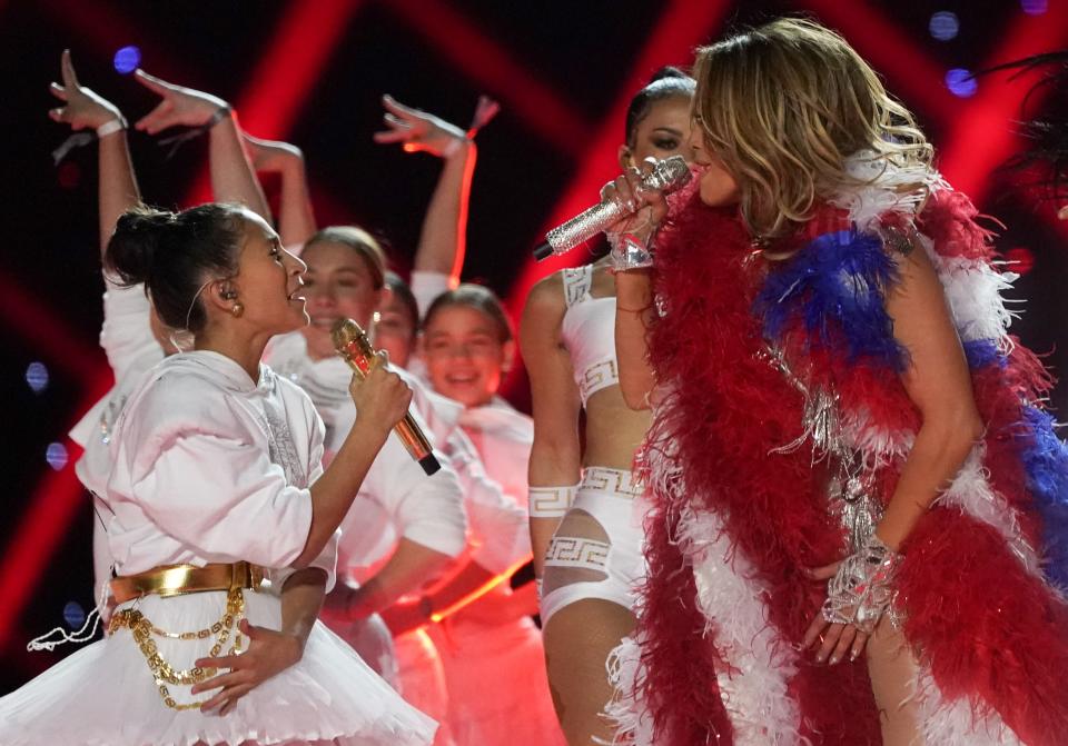 US singer Jennifer Lopez and her daughter Emme Muniz (L) perform during the halftime show of Super Bowl LIV between the Kansas City Chiefs and the San Francisco 49ers at Hard Rock Stadium in Miami Gardens, Florida, on February 2, 2020. (Photo by TIMOTHY A. CLARY / AFP) (Photo by TIMOTHY A. CLARY/AFP via Getty Images)