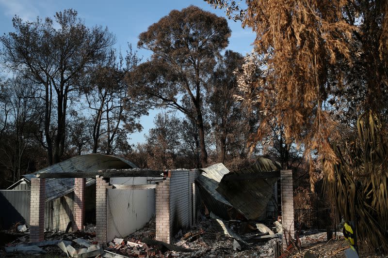 The remnants of a destroyed home, burnt in the recent bushfires, is pictured in Conjola Park