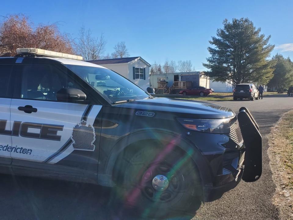 Fredericton police are shown at the scene of a shooting earlier this month. (Shane Fowler/CBC - image credit)