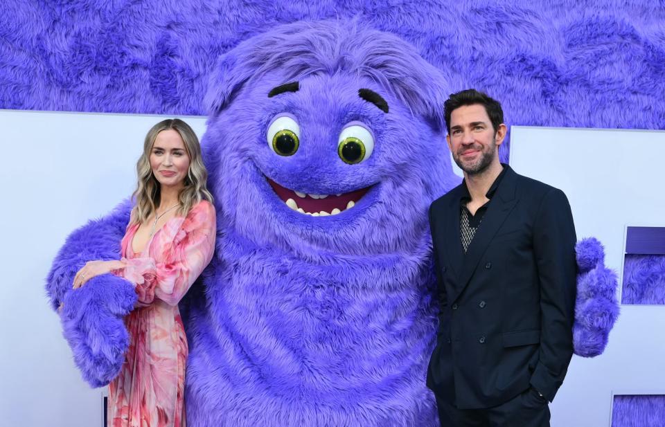 John Krasinski, right, says he and his wife, Emily Blunt, got "two thumbs up" from their daughters on "IF." Blunt voices a unicorn in the movie.