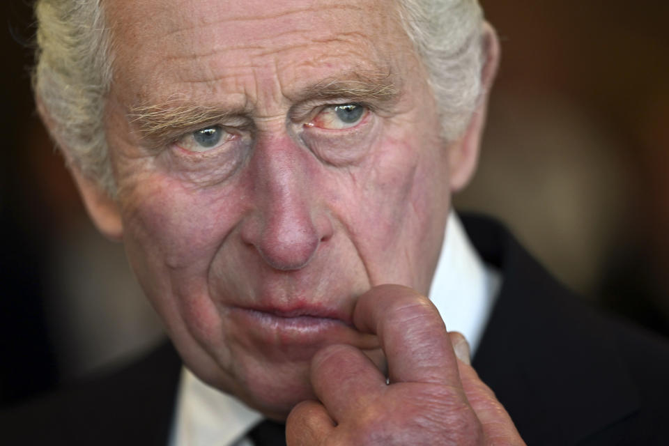 FILE - Britain's King Charles III gestures during a visit to the Metropolitan Police Service Special Operations Room (SOR) to thank Emergency Service workers for their work and support, ahead of the funeral of late Queen Elizabeth II, at the Lambeth headquarters in London, Saturday, Sept. 17, 2022. King Charles III will be crowned Saturday, May 6, 2023 at Westminster Abbey in an event full of all the pageantry Britain can muster. (Carl de Souza/Pool via AP, File)