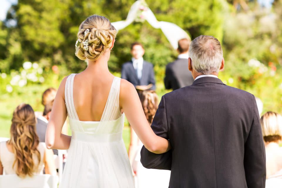 Anyone can walk the bride down the aisle. Photo: Getty Images