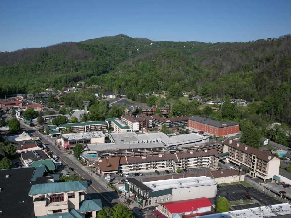 aerial view of buildings and greenery in Gatlinburg, Tennessee.