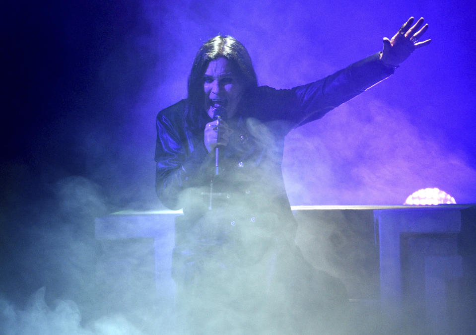 FILE - This Nov. 24, 2019 file photo shows Ozzy Osbourne performing at the American Music Awards in Los Angeles. The 71-year-old Grammy winner and former vocalist for the metal band Black Sabbath said during an interview on “Good Morning America” that aired Tuesday, Jan. 21, 2020, that he's been diagnosed with Parkinson's disease, a nervous system disorder that affects movement. The diagnosis came after a fall last year. (Photo by Chris Pizzello/Invision/AP, File)