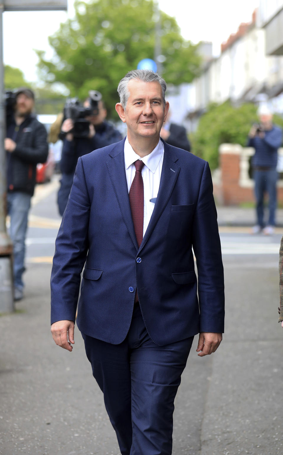 Democratic Unionist Party members Edwin Poots leaves the party headquarters in east Belfast after voting took place to elect a new leader on Friday May 14, 2021. Edwin Poots and Jeffrey Donaldson are running to replace Arlene Foster. (AP Photo/Peter Morrison)
