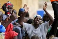 A woman rescued from Boko Haram in Sambisa forest is seen celebrating her freedom at Malkohi camp for Internally Displaced People in Yola, Adamawa State, Nigeria May 3, 2015. REUTERS/Afolabi Sotunde